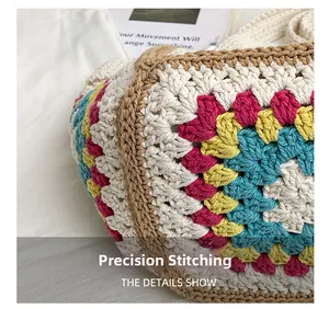 Detail showing the precision stitching and woven texture of the checkered knit tote bag