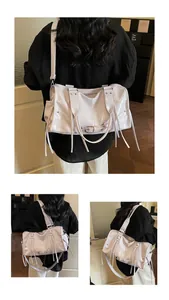 Detail view of large lavender patent leather tote with retro tassels and rivets