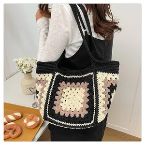 Detailed view of handmade crochet tote bag featuring vintage checkered knit pattern