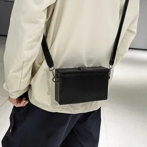 Minimalist black box crossbody bag in premium matte PU leather with metal clasp