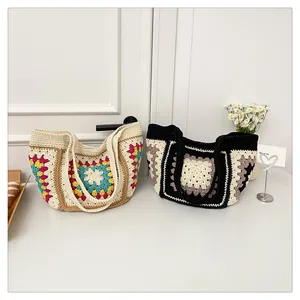 Handcrafted knit tote bag with colorful granny square pattern and boho crochet texture