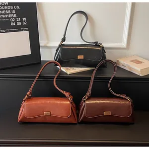 Borsa a spalla vintage francese in pelle nera, caramello e marrone caffè a baguette