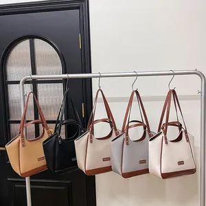 Grands sacs cabas minimalistes en similicuir PU en cinq couleurs neutres avec bandoulières