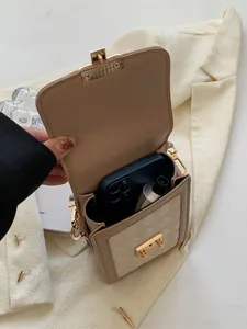 Chic quilted crossbody phone bag for women with gold clasp and neutral patchwork design
