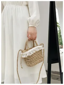 Detail of straw woven bucket bag with elegant lace trim and pearl accents for beach vacation