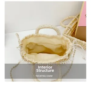 Internal structure of straw bucket bag with drawstring liner and pearl lace trim
