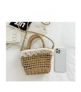Detail of straw woven bag with white lace, pearl trim, and inner lining for daily storage