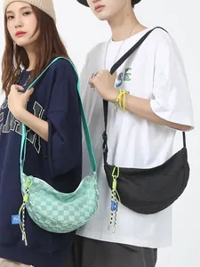 Minimalistische geruite muntgroene en zwarte crossbody tas met brede banden