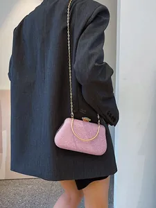 Sparkling pink rhinestone evening clutch bag with gold chain strap and crystal clasp