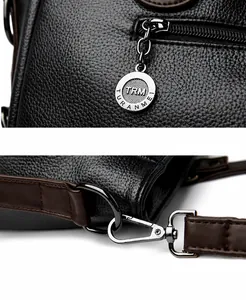 Details des polierten schwarzen Reißverschlusses und abnehmbaren Haken der Tasche