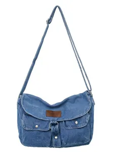 Retro denim crossbody bag with dual front pockets and adjustable shoulder strap
