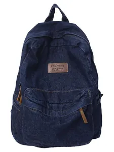 Dunkelblauer Denim-Rucksack für Damen mit großer Fronttasche und Details aus Lederimitat