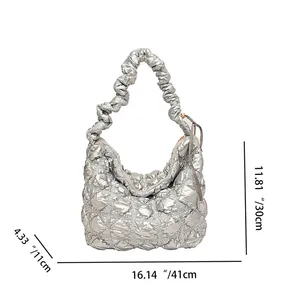 Detailed view of silver quilted puff tote bag with size dimensions 41cm x 30cm x 11cm