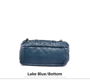 Lake blue woven leather shoulder bag showing the rectangular bottom and stitching detail