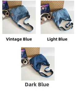 Three colors of denim crossbody bags shown with adjustable straps in a workspace setting