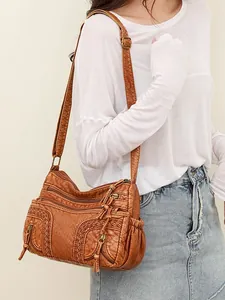 Brown washed PU leather shoulder bag for women with multi-pocket and vintage woven detail