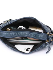 Deep teal washed faux leather crossbody bag with multiple zipper compartments and large capacity
