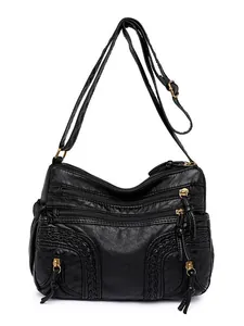 Black washed leather crossbody bag for women with multi-zipper pockets and woven texture