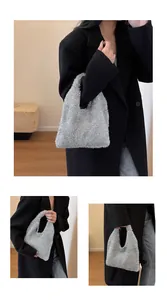 Detail view of a silver sequin tote bag with a sparkling texture and metallic finish