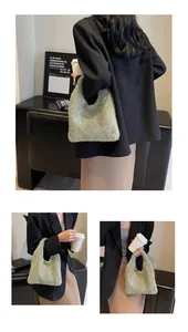 Detailed view of the sparkling gold woven texture and finish of the elegant tote bag