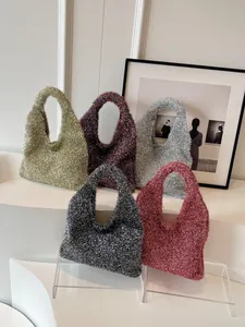 Chic glitter sequin shoulder bags in five colors for women shown on a fashion display