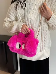 Borsa a mano in peluche rosa con occhi a cartone animato e tracolla a catena d'oro