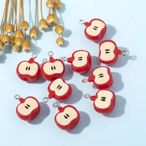 Realistic red apple core resin charms with silver eyelet hooks for DIY crafts