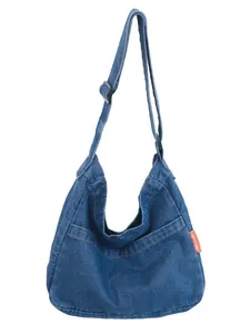 Vintage dark blue denim hobo crossbody bag with adjustable strap and front pocket