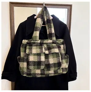 Detail of plush lamb wool tote bag with green and white checkerboard pattern pockets