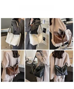 Detail showing white, brown, and black PU leather tote bags with metal rivet accents