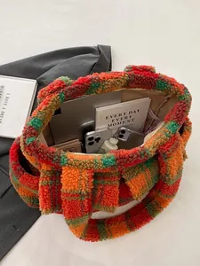 Fleece plaid tote bag for women showing large capacity with laptop and accessories