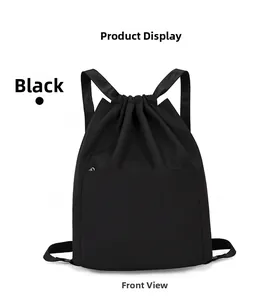 Front view of large capacity black nylon drawstring backpack with zipper pocket
