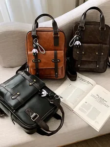 Vintage PU leather backpacks in black and brown with cute bear charm and metal studs