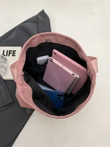 Pink large capacity faux suede tote bag with wide strap and magnetic closure