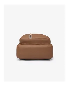 Detail view of brown lychee grain leather crossbody bag base with gold metal zipper
