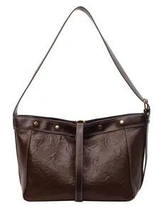 Brown vintage faux leather tote bag with gold studs and contrasting white stitching details