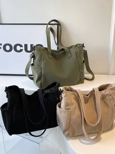 Corduroy tote bag in multiple colors featuring large capacity and adjustable straps