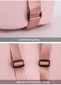 Detail view of pink nylon backpack with adjustable straps and sturdy plastic buckles