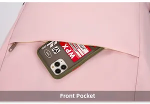 Detailed front pocket of pink nylon backpack featuring a functional silver metal zipper