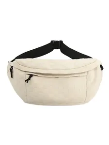 Minimalist woven chest bag in cream white with adjustable black strap for urban fashion