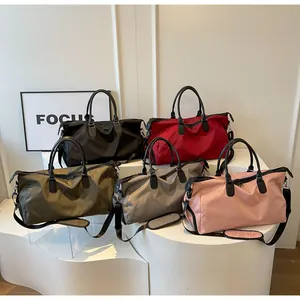 Detailed display of five color options for large capacity waterproof travel duffel bags