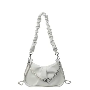 Chic white ruched cloud bag with pearl chain and scrunched strap for summer styling