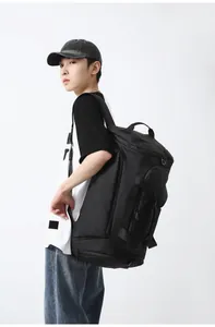 Detail view of large capacity fitness backpack with water-resistant fabric and side handle