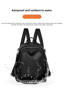 Zaino impermeabile in pelle PU con texture litchi e dettaglio superficie idrorepellente