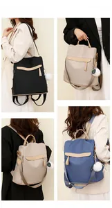 Détails du sac à dos léger en nylon montrant les modes de transport main et épaule