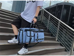 Detail view of large capacity waterproof blue travel bag with multiple storage pockets