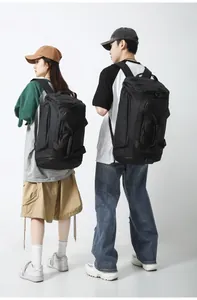 Black large-capacity gym bag with waterproof fabric and multi-pocket functional design