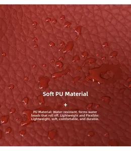 Close-up of waterproof red litchi grain PU leather showing soft and flexible texture