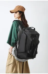 Detail of high-capacity black sports bag with waterproof fabric and side zipper pocket