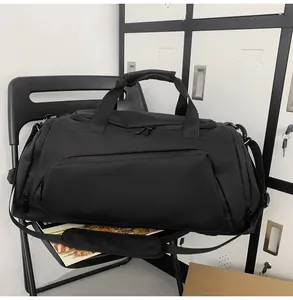Detail view of large gym bag with waterproof material on a locker room chair